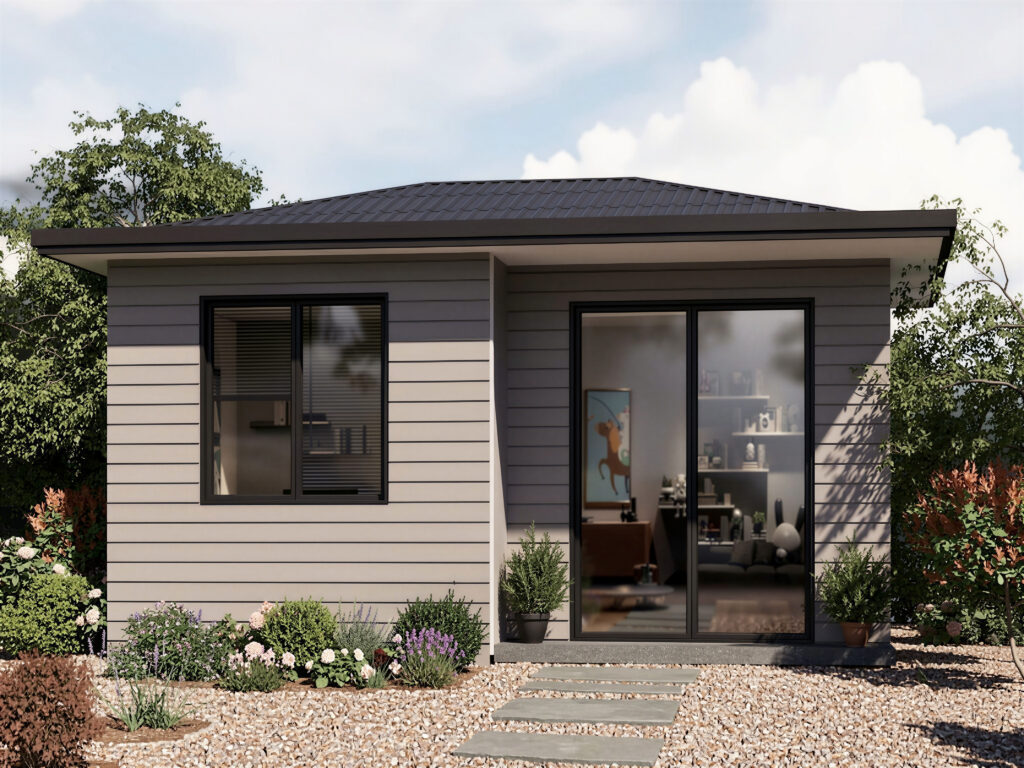 Modern single-story granny flat with horizontal siding, large glass doors, and landscaped garden in Sydney backyard