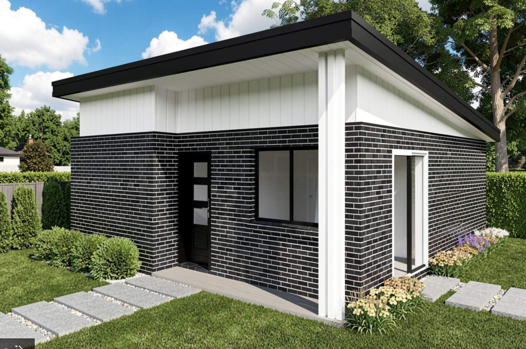 Modern single-story granny flat with dark brick exterior, white trim, and landscaped garden in Sydney backyard